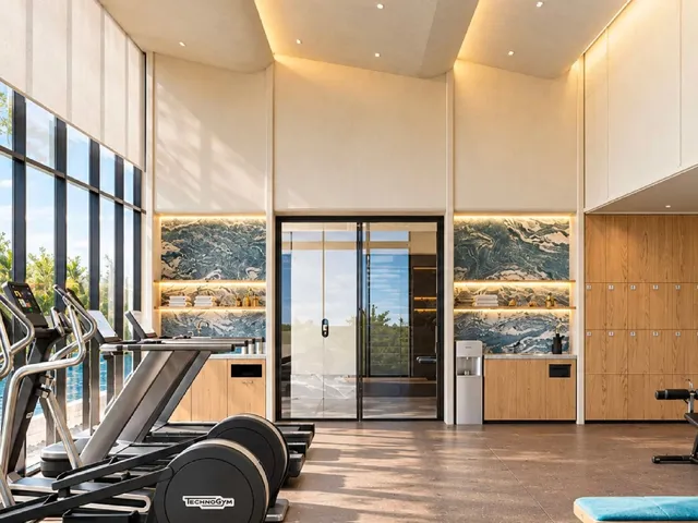 The Title Kuartz cardio equipment beside floor-to-ceiling windows